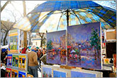 Parisian street paintings on sale at Montmartre art market