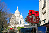 PARIS sign and basilica Sacre Coeur (Sacré-Cœur) in Montmartre